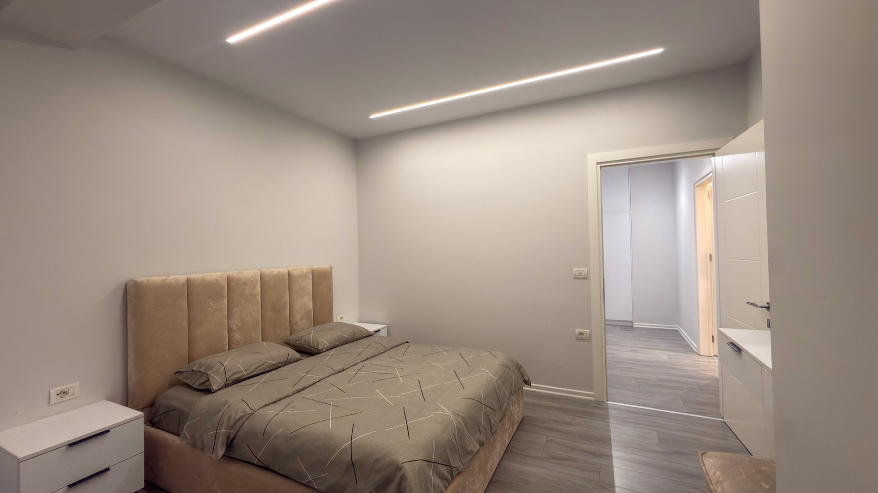 Bedroom with LED ceiling lines